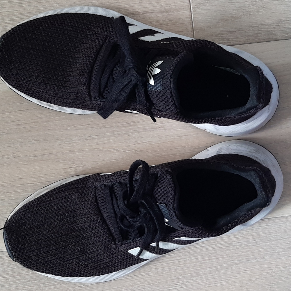 Used black Adidas sneakers